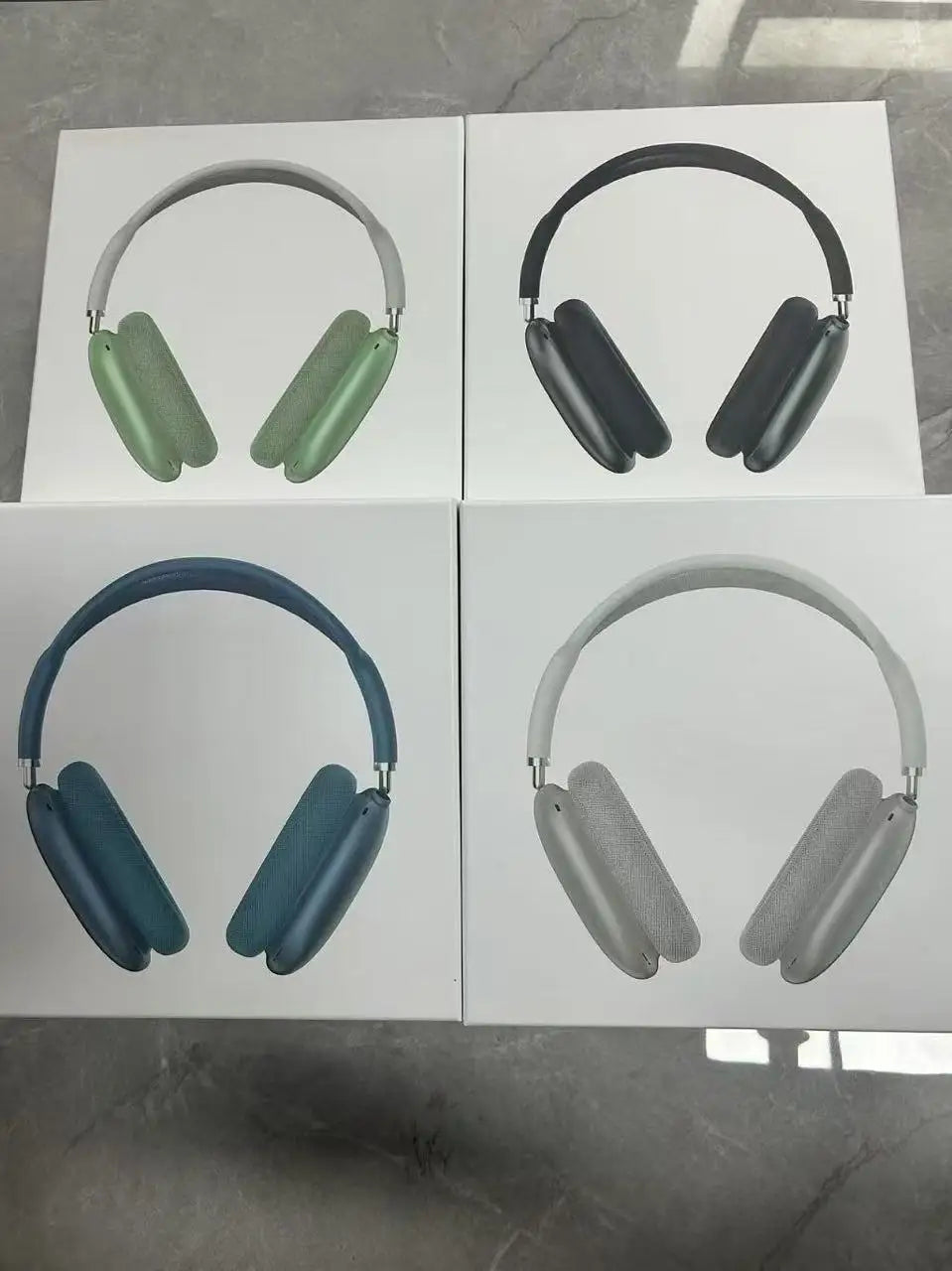 OLDWAY headset with long battery life and noise reduction, displayed in green packaging on a gray surface.